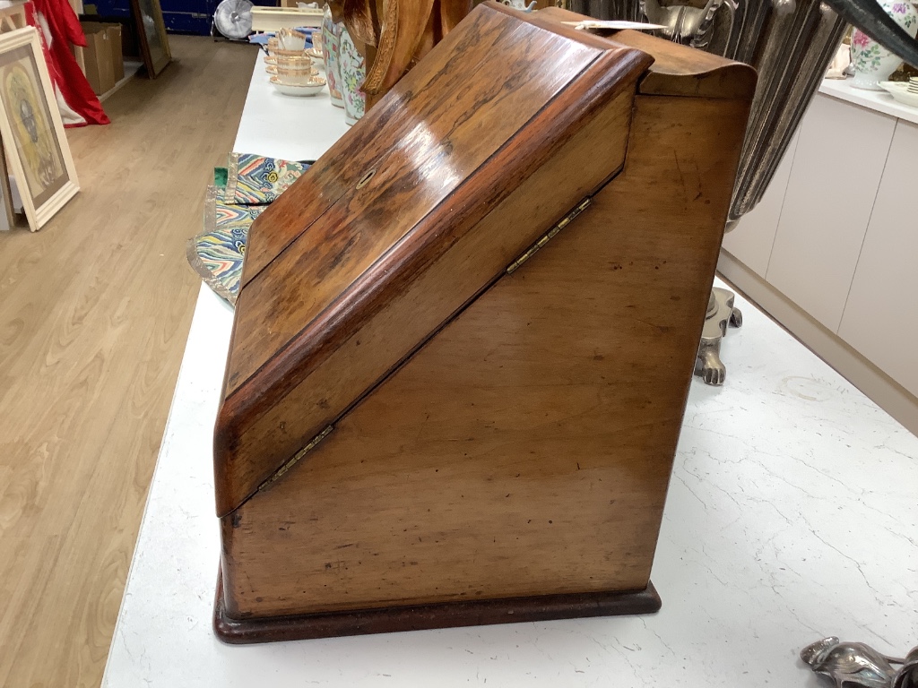 A Victorian walnut stationery box with fitted interior, height 31cm